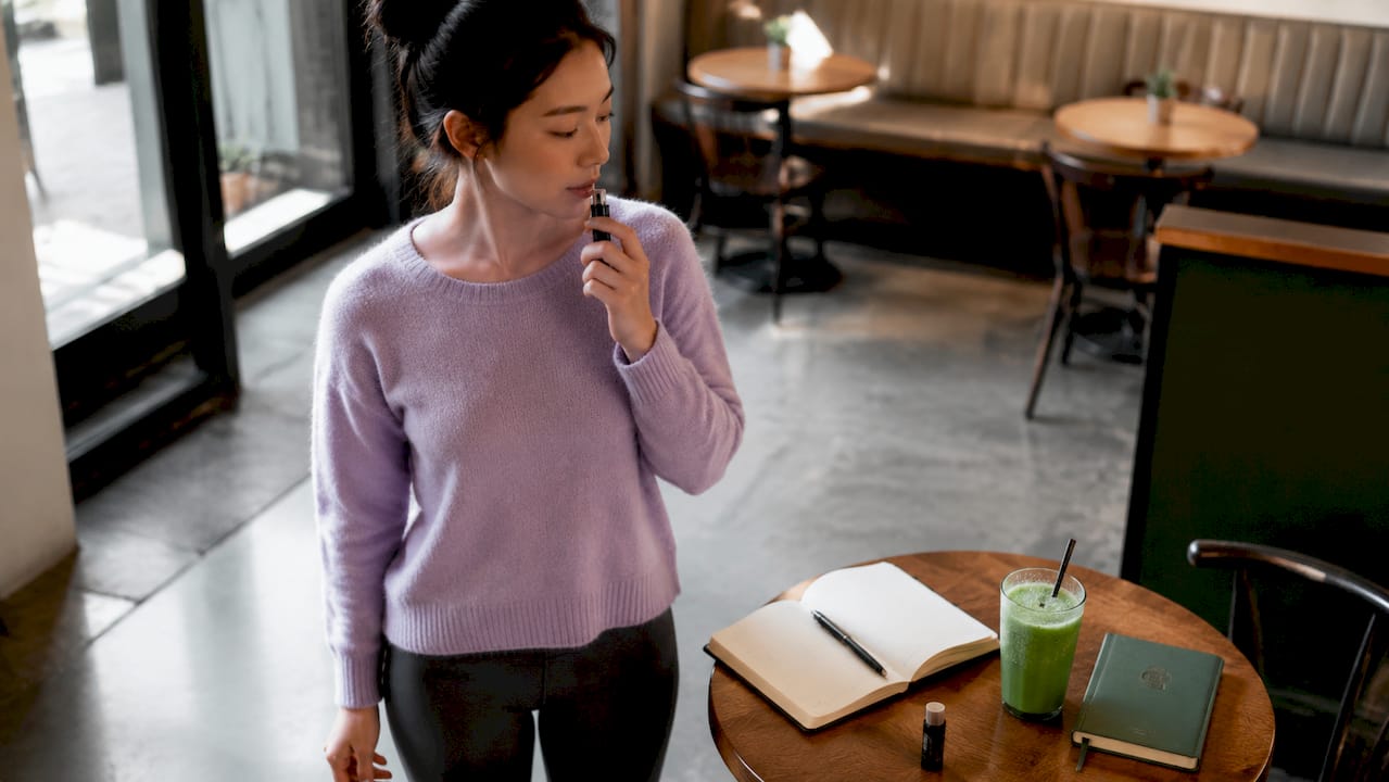 Woman managing nicotine cravings at desk
